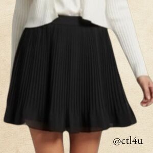 Candie’s Black Pleated Mini Skirt L Flowy Lined Elastic Back